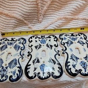 Delft. 3 single lightswitch covers and 1 double. Gorgeous hand painted ceramic.